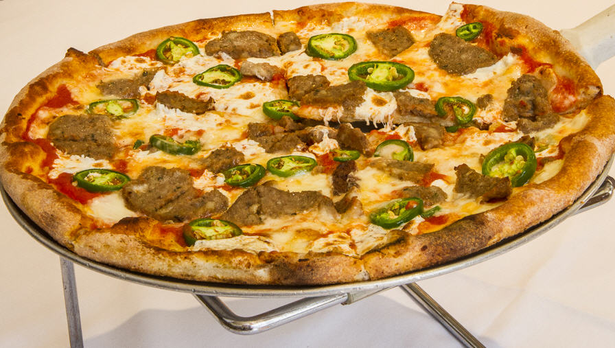 Discover Patsy’s Pizzeria in Greenwich, where New York’s famous coal-fired pizza meets a refined Italian dining experience. Enjoy classic pizzas, steaks, and more.